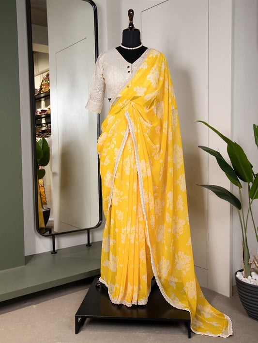 Yellow georgette saree with white pre-made blouse